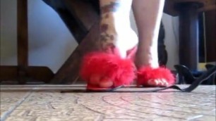 Rainha Dourada - wearing marabou slippers and whip