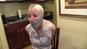 Duct Tape Wrap Gagged and Tied in Chair